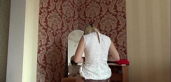  Blonde with a juicy ass trying on sexy clothes and spinning around the mirror, homemade striptease.